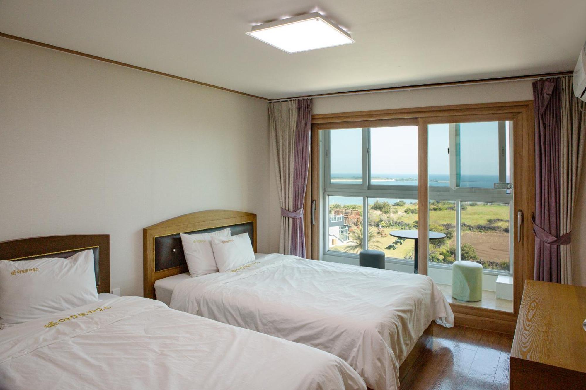 Hotel Amor Чеджудо Номер фото